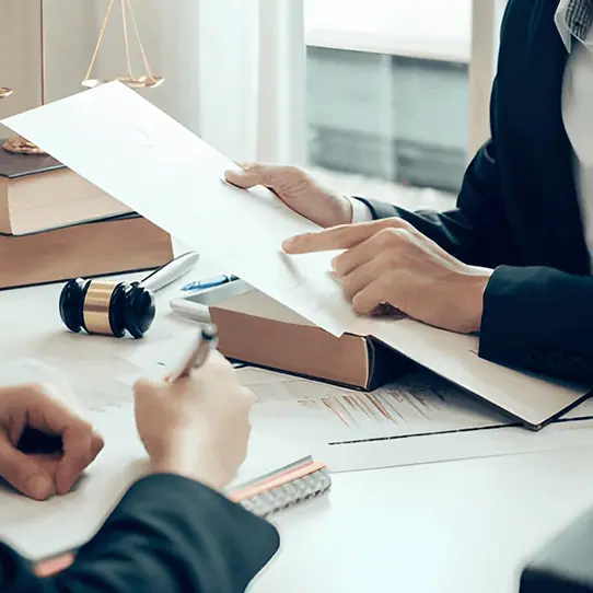 Paralegal team organizing case files and discovery documents
